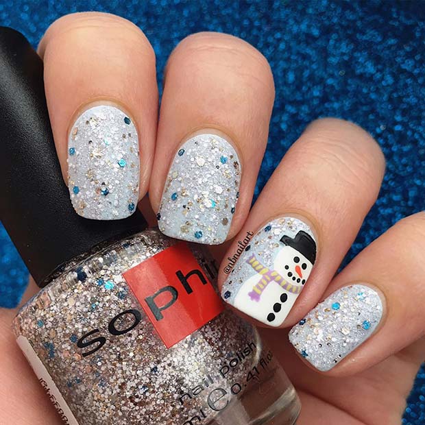 Glitter and Snowman Nail Design