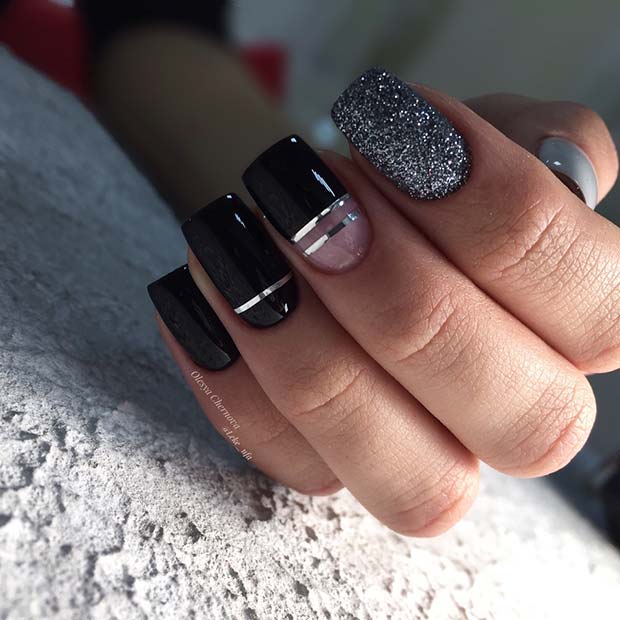 Stylish Black Nails with Silver Nail Art and Glitter