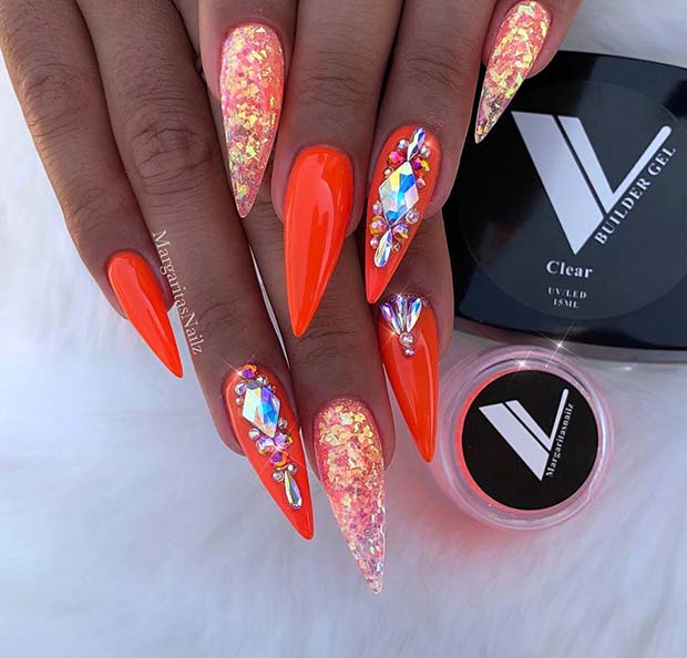 Vibrant Orange Nails with Sparkle