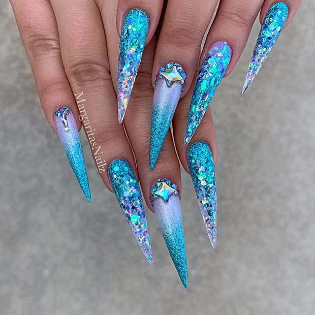 Glam and Sparkly Blue Ombre Stiletto Nails
