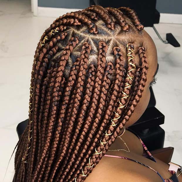 Stylish Brown Braids with a Gold Cord