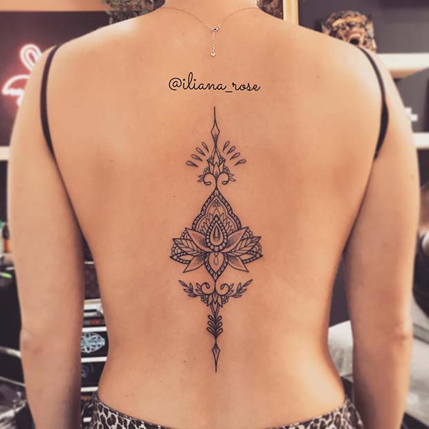 Stunning Lotus Spine Tattoo