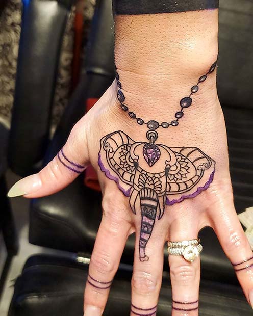 Unique Hand Tattoo