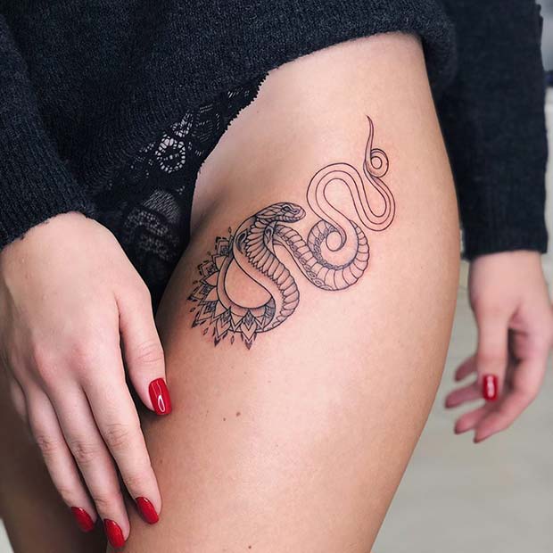 Cute snake done by @enigmatic_tattoo 🐍🌙✨ #illinoistattooco  #downtownbloomingtonil #lineworktattoo #snaketattoo #celestialtattoo… |  Instagram