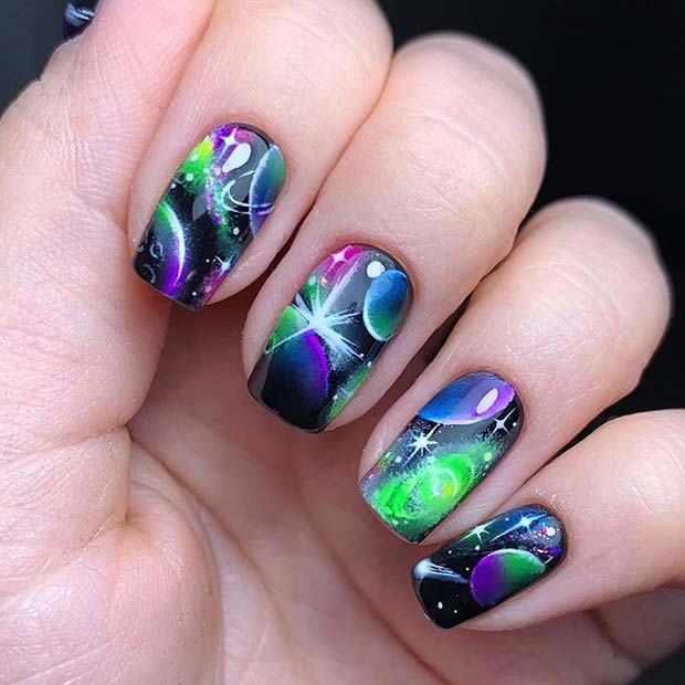Bold Nail Art with Planets