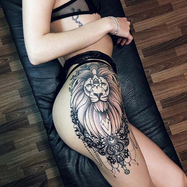 Thigh Tattoo with a Lion and Lace