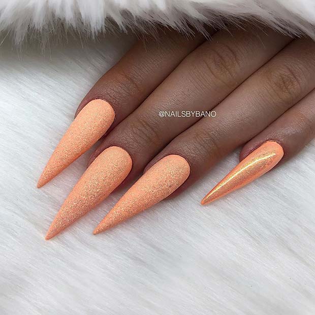 Glitzy Pastel Orange Stiletto Nails