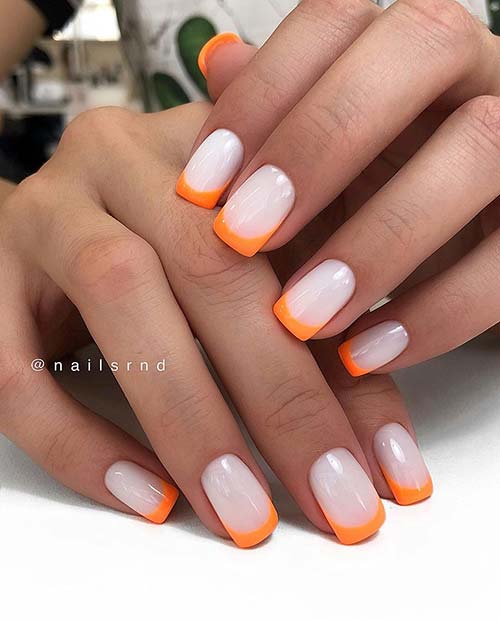 Light Nails with Orange Tips