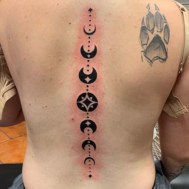 Moon Phases on Spine Tattoo Idea